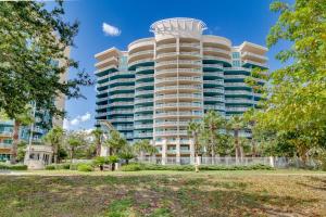 a tall building with a dome on top at Beachfront Gulfport Vacation Rental with Balcony! in Gulfport