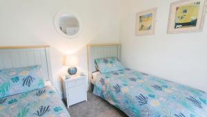 Postel nebo postele na pokoji v ubytování Min y Don