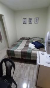 Een bed of bedden in een kamer bij Rioli quarto 2