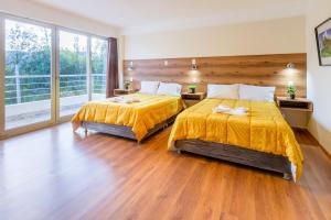 Katil atau katil-katil dalam bilik di Valles Apartamentos Ecológicos VAE - Urubamba Cusco Perú