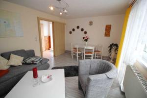 Posezení v ubytování Ferienhaus Frisch