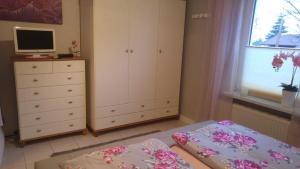 Katil atau katil-katil dalam bilik di Ferienhaus Peters