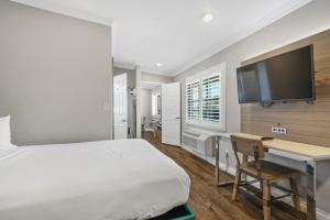 TV a/nebo společenská místnost v ubytování Motel Mediteran