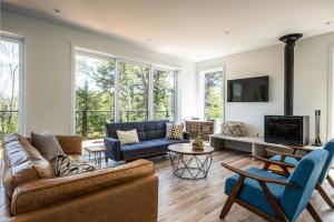 TV a/nebo společenská místnost v ubytování Chalet Alpine by Tremblant Platinum