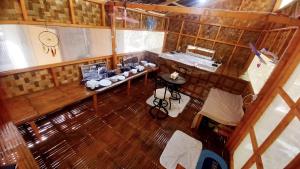 an overhead view of a kitchen in a house at Wellness & Fitness In Life La Union Postural & Joint Alignment Yoga Retreat Yoga Session Center 