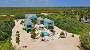 an aerial view of a house on the beach at The Turtle Nest at Cottages in Sand Bluff