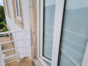 Balkón nebo terasa v ubytování Coliving The VALLEY Portugal countryside retreat for digital nomads and hiking lovers - PRIVATE BEDROOMS with SHARED BATHROOMS, shared kitchen, and coworking space