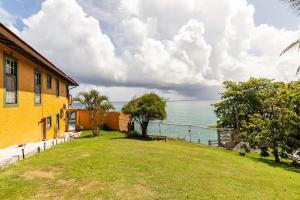 a house with a view of the ocean at Water Lovers Paradise! in Ocho Rios