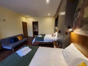 Letto o letti in una camera di Hotel Inti Quito