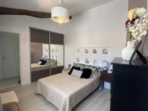 Ένα ή περισσότερα κρεβάτια σε δωμάτιο στο Appartement moderne T3 duplex