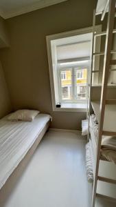 Postel nebo postele na pokoji v ubytování Tromso Center Apartment
