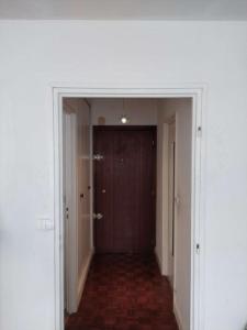 an empty hallway with a door in a building at Puteaux - PARIS LA DEFENSE in Puteaux