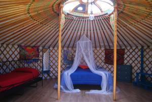Cama o camas de una habitación en Yurta Gaia