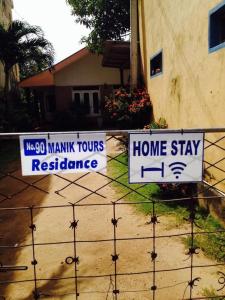 Certifikát, hodnocení, plakát nebo jiný dokument vystavený v ubytování New Manik Homestay