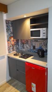 Departamento NYC 2 - Edificio VILAUT by INMOVE Temporarios的厨房或小厨房