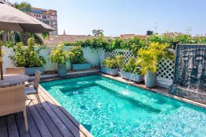 a swimming pool on top of a building at Cartagena Old City Mansion in Cartagena de Indias