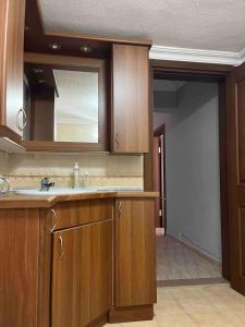 an empty kitchen with a sink and a mirror at VILLA in Tekirdag- Istanbul in Tekirdag