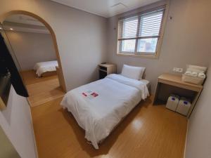Postel nebo postele na pokoji v ubytování Hotel razaB