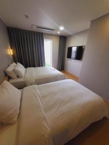 Postel nebo postele na pokoji v ubytování Hotel razaB