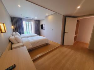 Postel nebo postele na pokoji v ubytování Hotel razaB