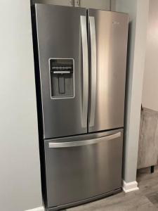 a stainless steel refrigerator in a kitchen at Downtown Home in Chattanooga in Chattanooga