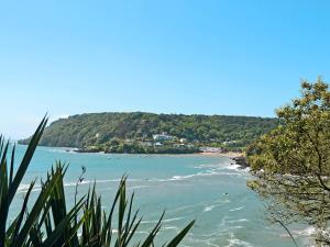 a view of a beach with people in the water at Estuary House Flat 3 in Salcombe