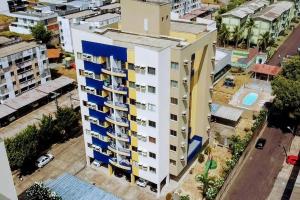 an overhead view of a apartment building with balconies at Sinta-se em casa! Lindo Ap para você e sua família in Manaus