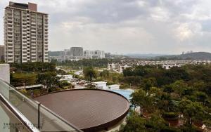 a view of a city with a pool and buildings at THE LOFT@Dwiputra Putrajaya. in Putrajaya