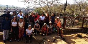 a group of people posing for a picture on a mountain at Hotel Maa Mira Villa in Khajurāho