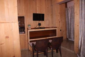 TV a/nebo společenská místnost v ubytování Hotel Mannat Sach Pass