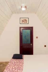 Postel nebo postele na pokoji v ubytování Harmony Beach Resort