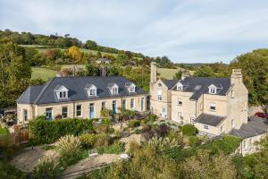 an aerial view of a large house at Spacious 2 Bedroom House With Stunning Views in Bath