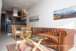 Kuchyň nebo kuchyňský kout v ubytování Escape Condominiums Beachfront Suites - Mae Phim
