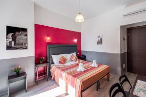 Postel nebo postele na pokoji v ubytování MF Hotel