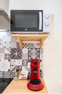 Kuchnia lub aneks kuchenny w obiekcie Villa des palmiers, Studio cosy