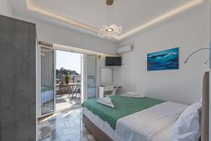 Postel nebo postele na pokoji v ubytování Margarita Suite