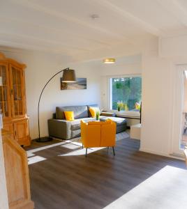 Χώρος καθιστικού στο Ferienhäuser Seepark Ternsche +96 φωτογραφίες