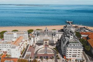an aerial view of a building next to a beach at Arcachon pied in Arcachon