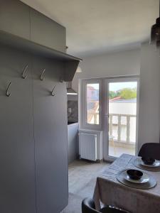 Η κουζίνα ή μικρή κουζίνα στο Maria City Apartament