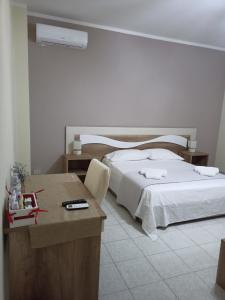 Postel nebo postele na pokoji v ubytování B&B AEREOSTATION