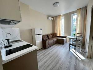 Kuchyňa alebo kuchynka v ubytovaní Eco Pro Apart on Kamanina + 10 fotografií