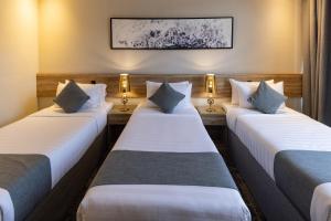 Postel nebo postele na pokoji v ubytování Anan Hotel by Snood