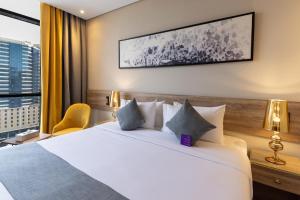 Postel nebo postele na pokoji v ubytování Anan Hotel by Snood