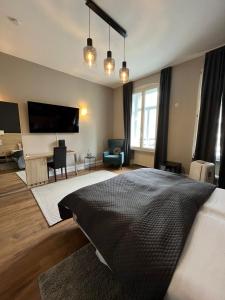 Postel nebo postele na pokoji v ubytování Denner Hotel