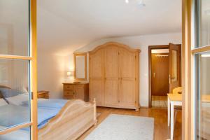 Cama o camas de una habitación en Ferienwohnung Zugspitznest