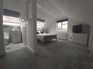Cama ou camas em um quarto em Stony Stratford Private Cosy Home