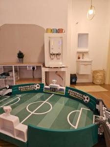 a toy kitchen with a basketball court in a room at Home at Indera Mahkota Kuantan Unifi 100mb+ TV BOX in Kuantan
