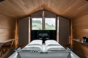 Posteľ alebo postele v izbe v ubytovaní Rote Wand Gourmet Hotel, a Member of Design Hotels