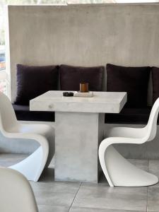 Posezení v ubytování CASAGOLD Glyfada Luxury Apartment Near The Sea
