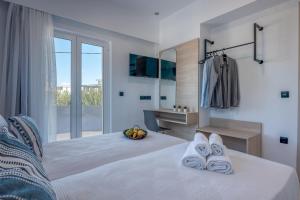 Ένα ή περισσότερα κρεβάτια σε δωμάτιο στο Lysithea Apartments - brand new, stylish & central +143 φωτογραφίες